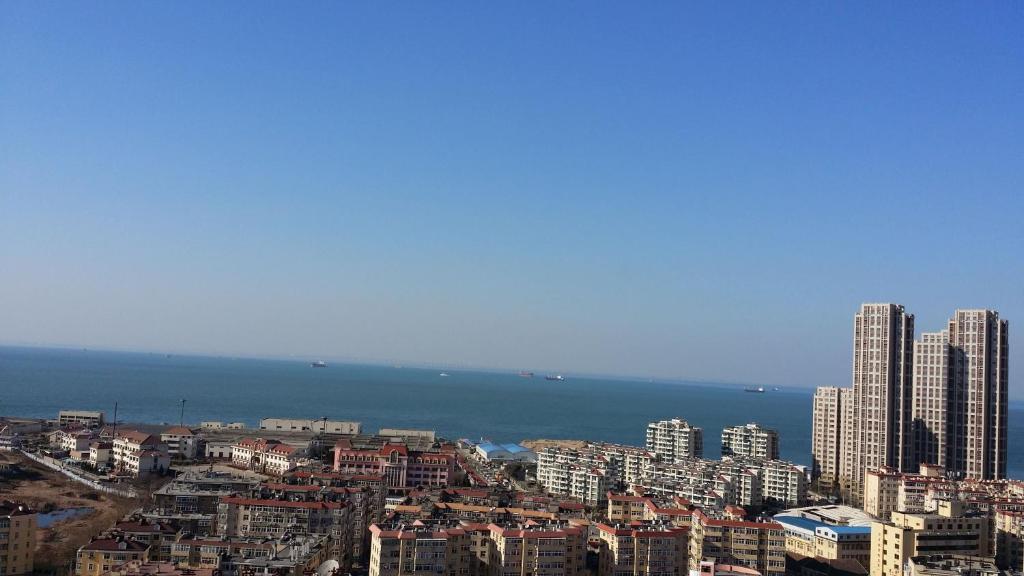 Super 8 Hotel Qingdao Railway Station Gui Zhou Road Buitenkant foto